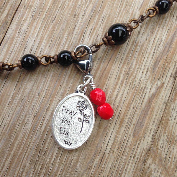 St. Rita Rosary Marker