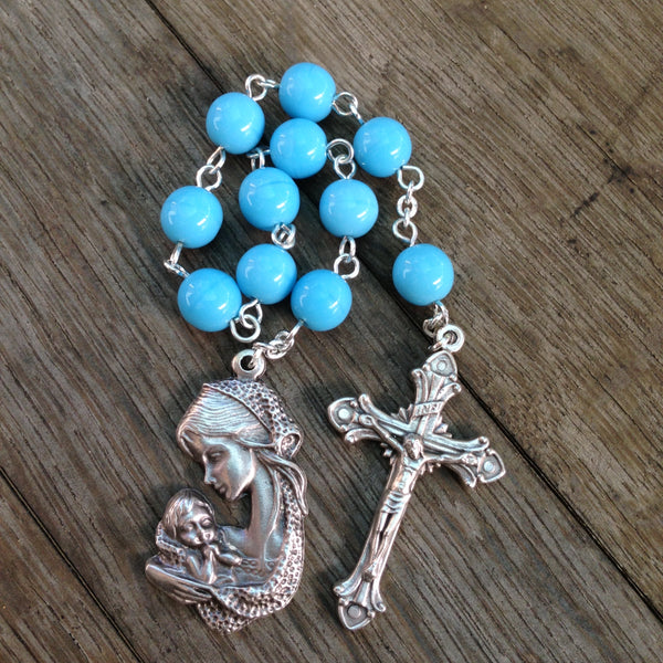 Blue pocket rosary with mother and child medal
