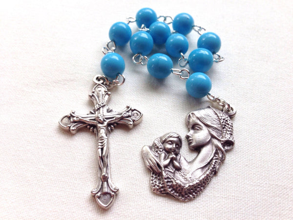 Blue pocket rosary with mother and child medal