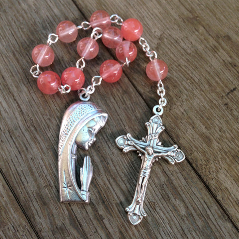 Pink Catholic pocket rosary with Madonna medal