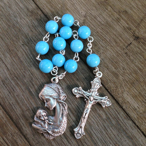 Blue pocket rosary with mother and child medal