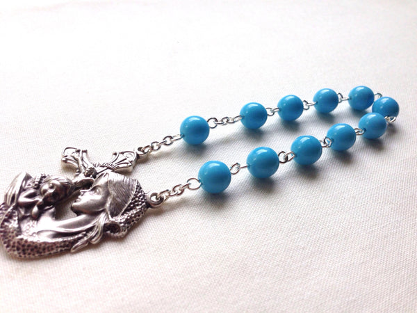 Blue pocket rosary with mother and child medal